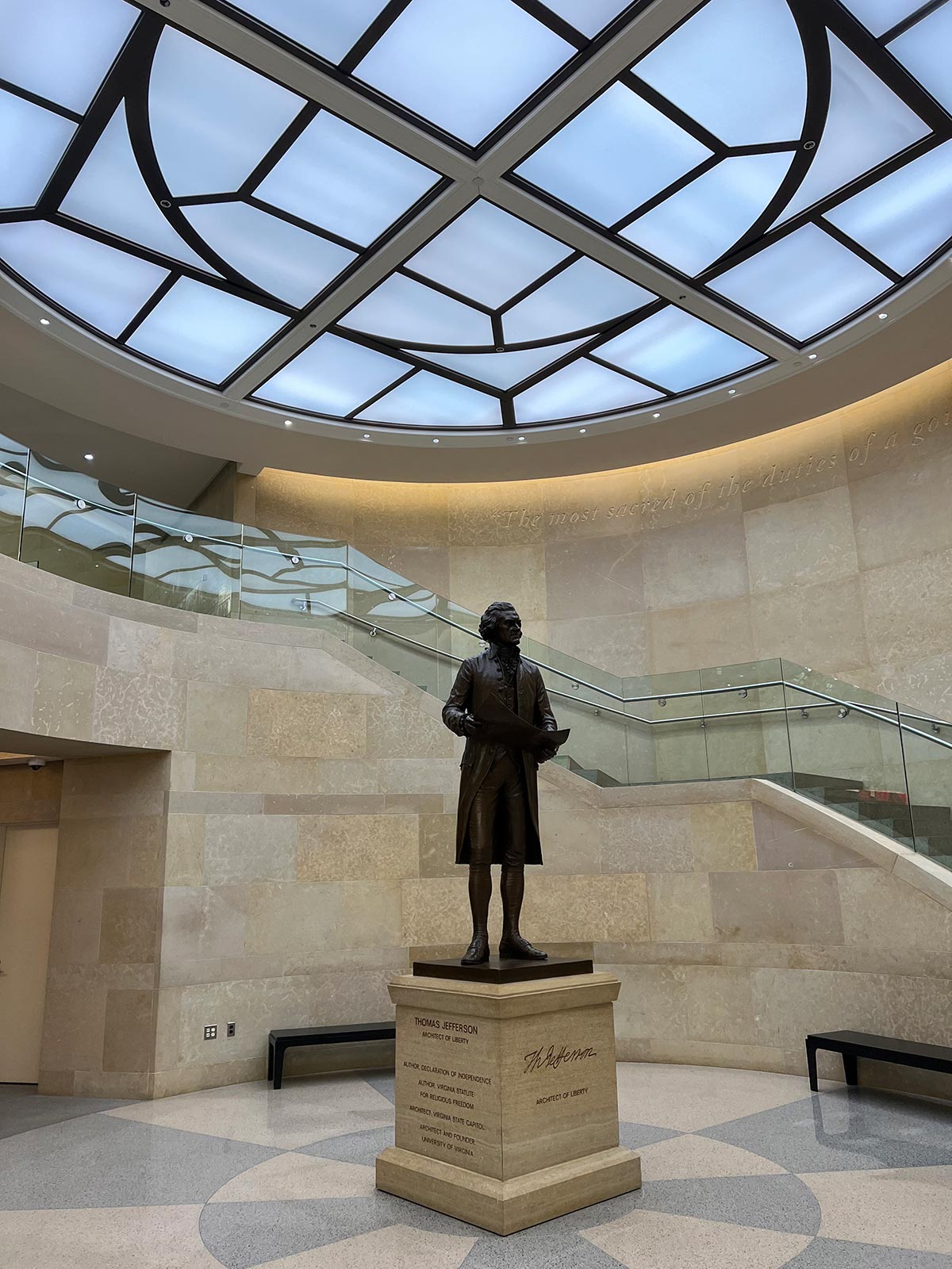 The rotunda of the National Museum of American History features a statue of Thomas Jefferson, highlighting his historical significance.